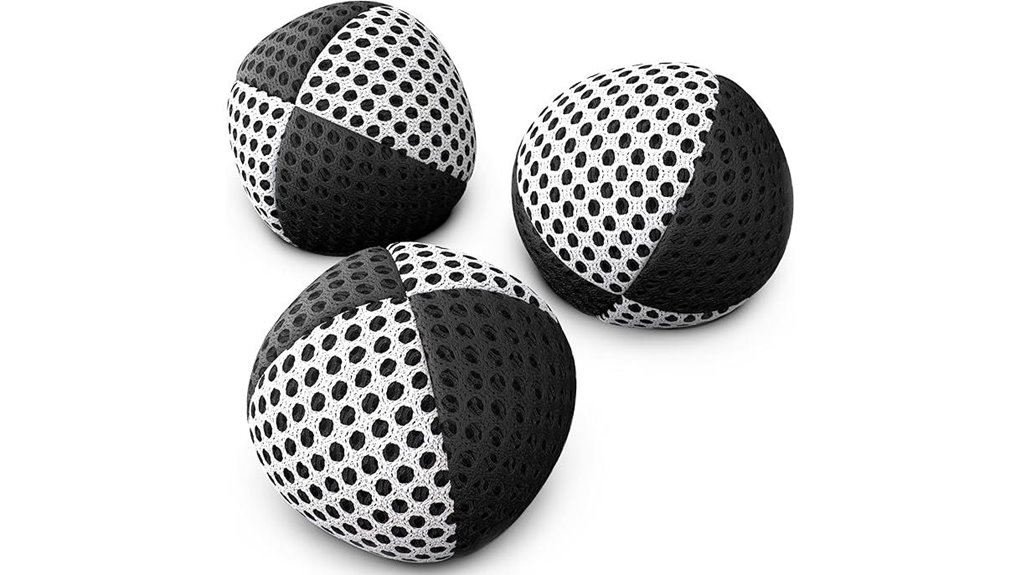 three black and white juggling balls